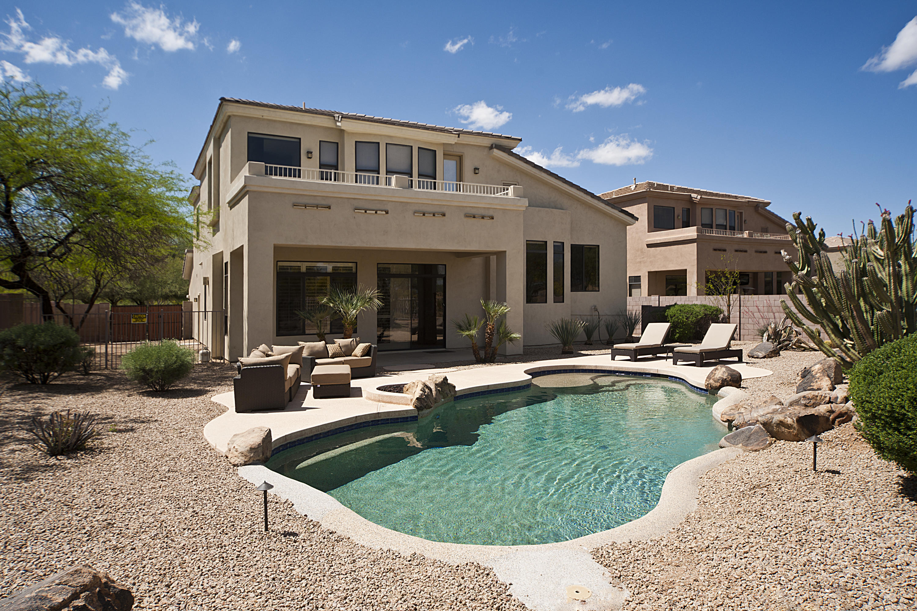 5258 East Hashknife Road Phoenix, AZ 85054 - Photo 16 of 44 REAR VIEW OF HOME AND POOL