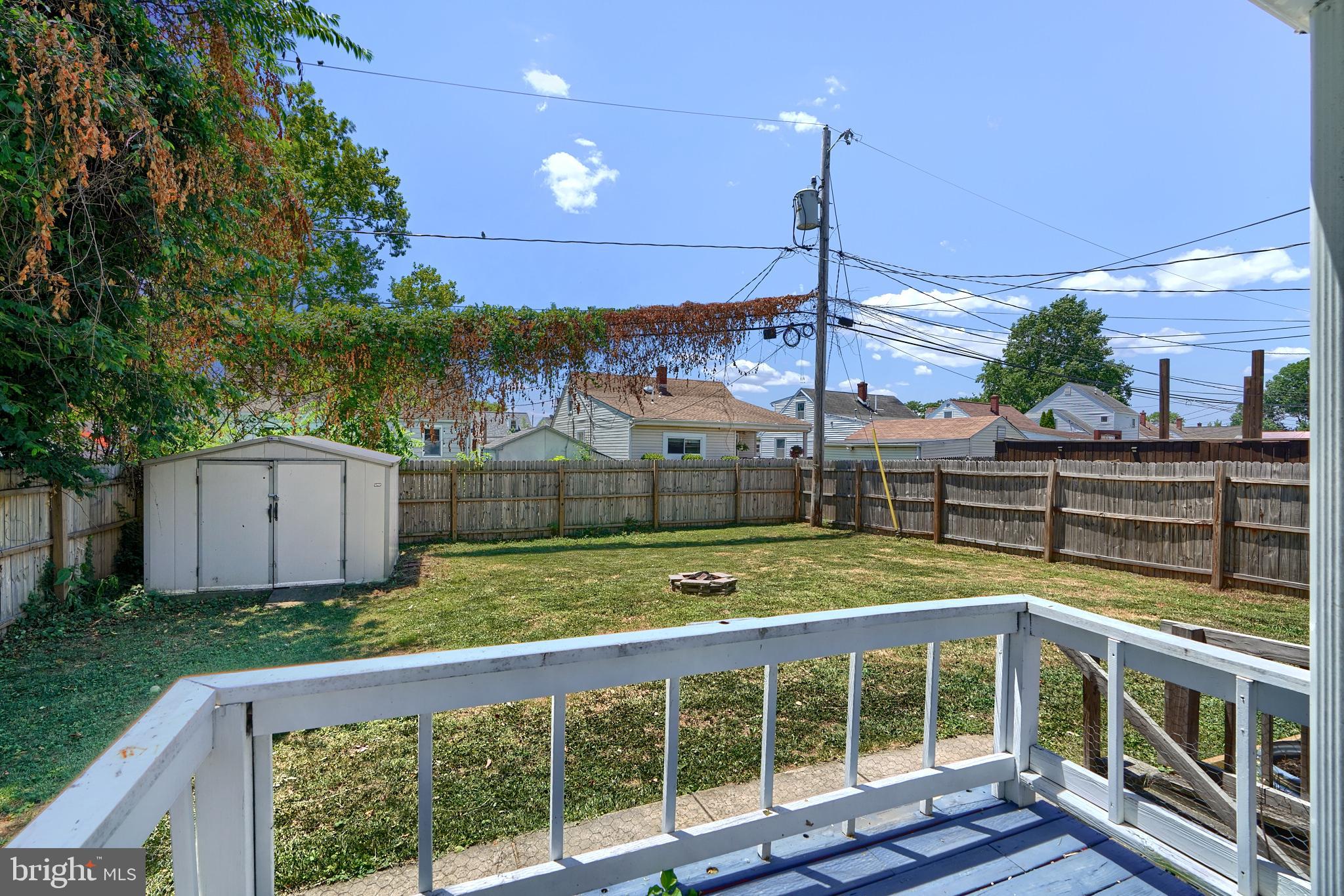 8239 Bullneck Road Dundalk, MD 21222 - Photo 3 of 35 Deck, shed , fire pit, fully privacy fenced yard