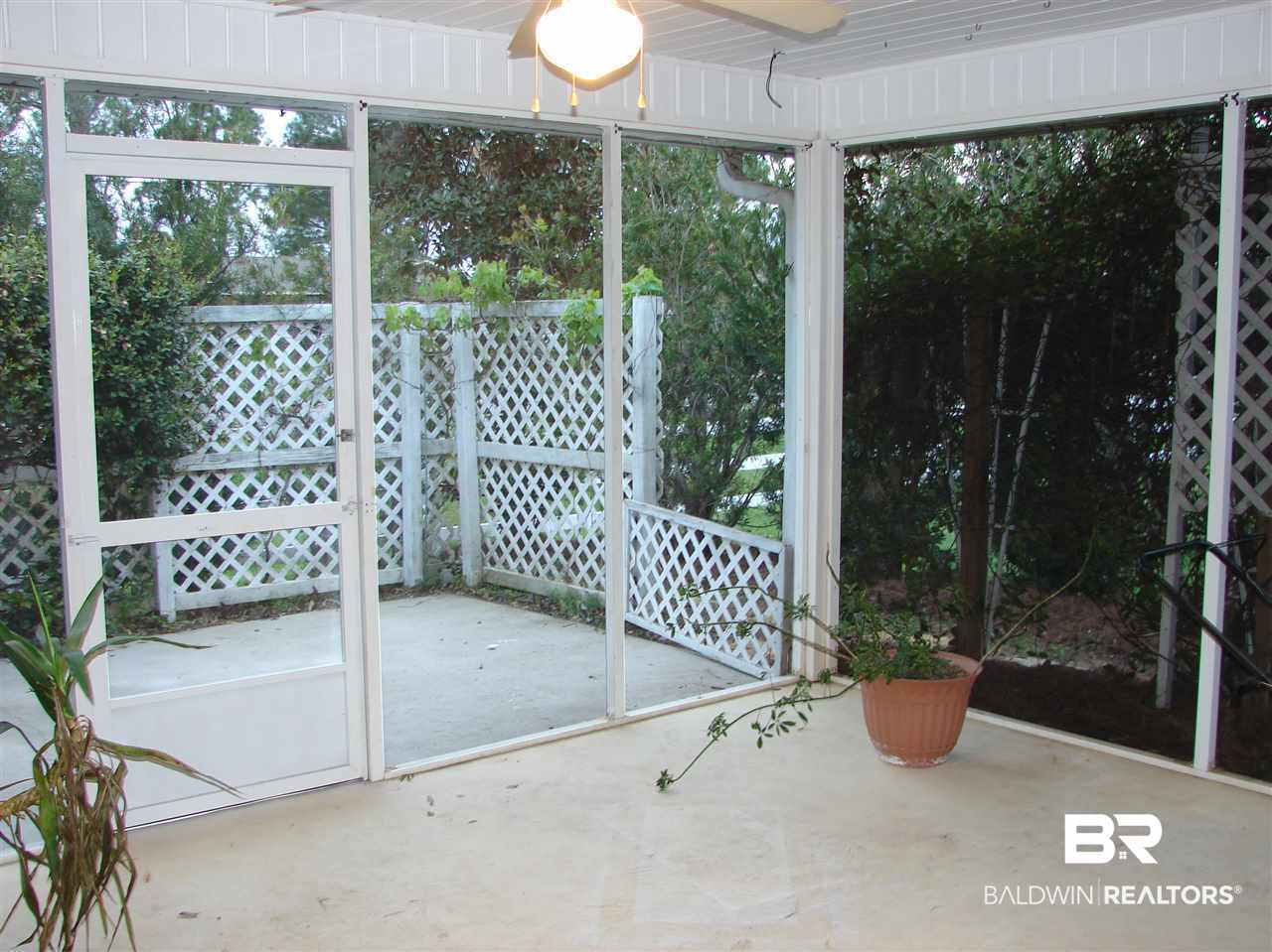22727 Respite Lane Foley, AL 36535 - Photo 13 of 27 Screened in porch