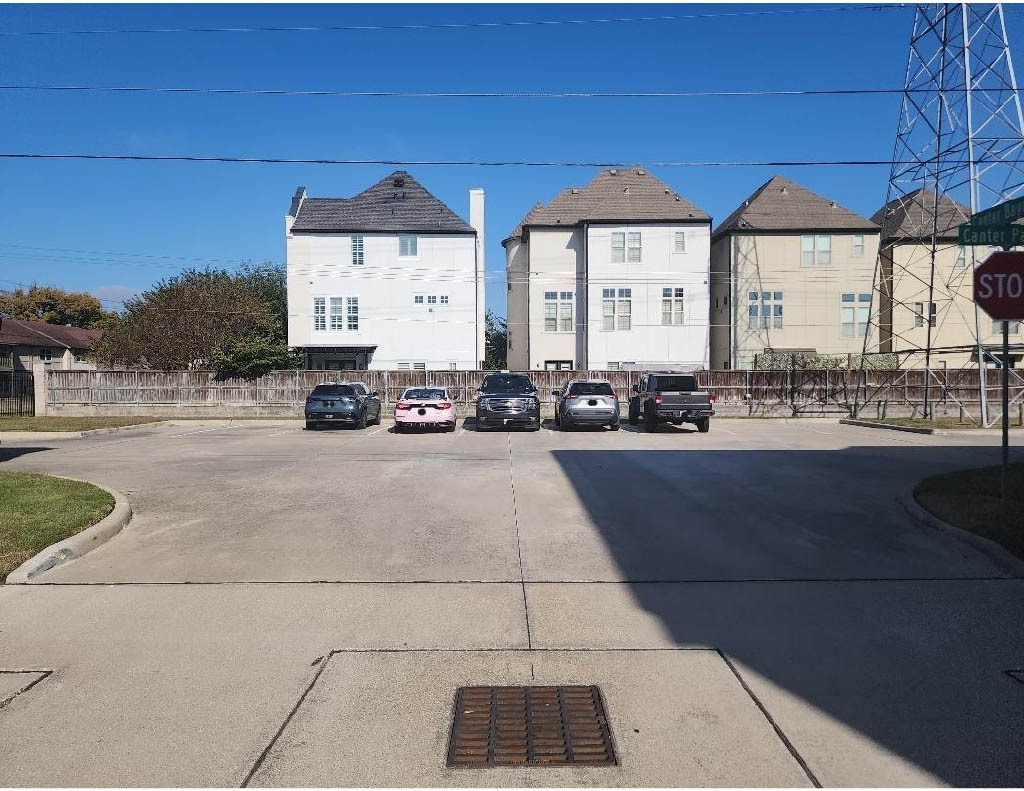 11013 Cres Light Way Houston, TX 77043 - Photo 13 of 14 a front view of a building with large trees