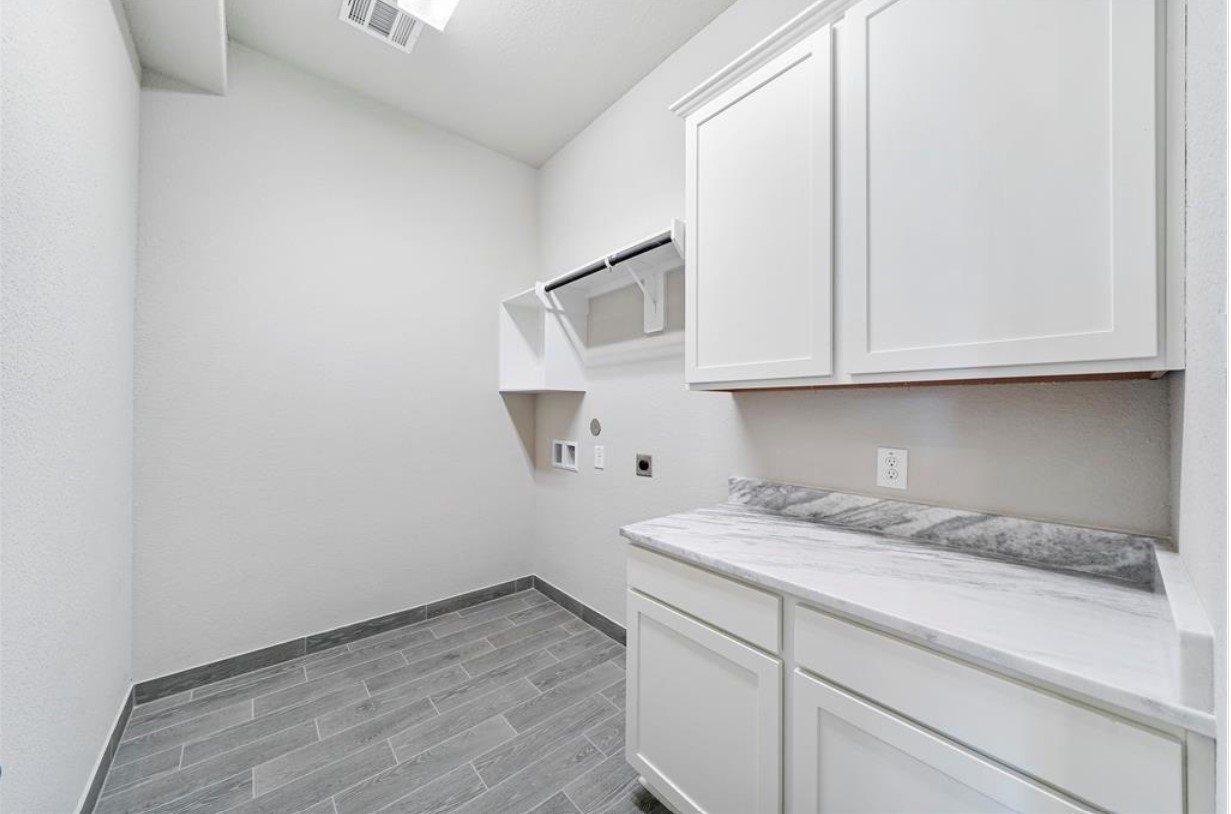 11013 Cres Light Way Houston, TX 77043 - Photo 10 of 14 a room with a sink and cabinets