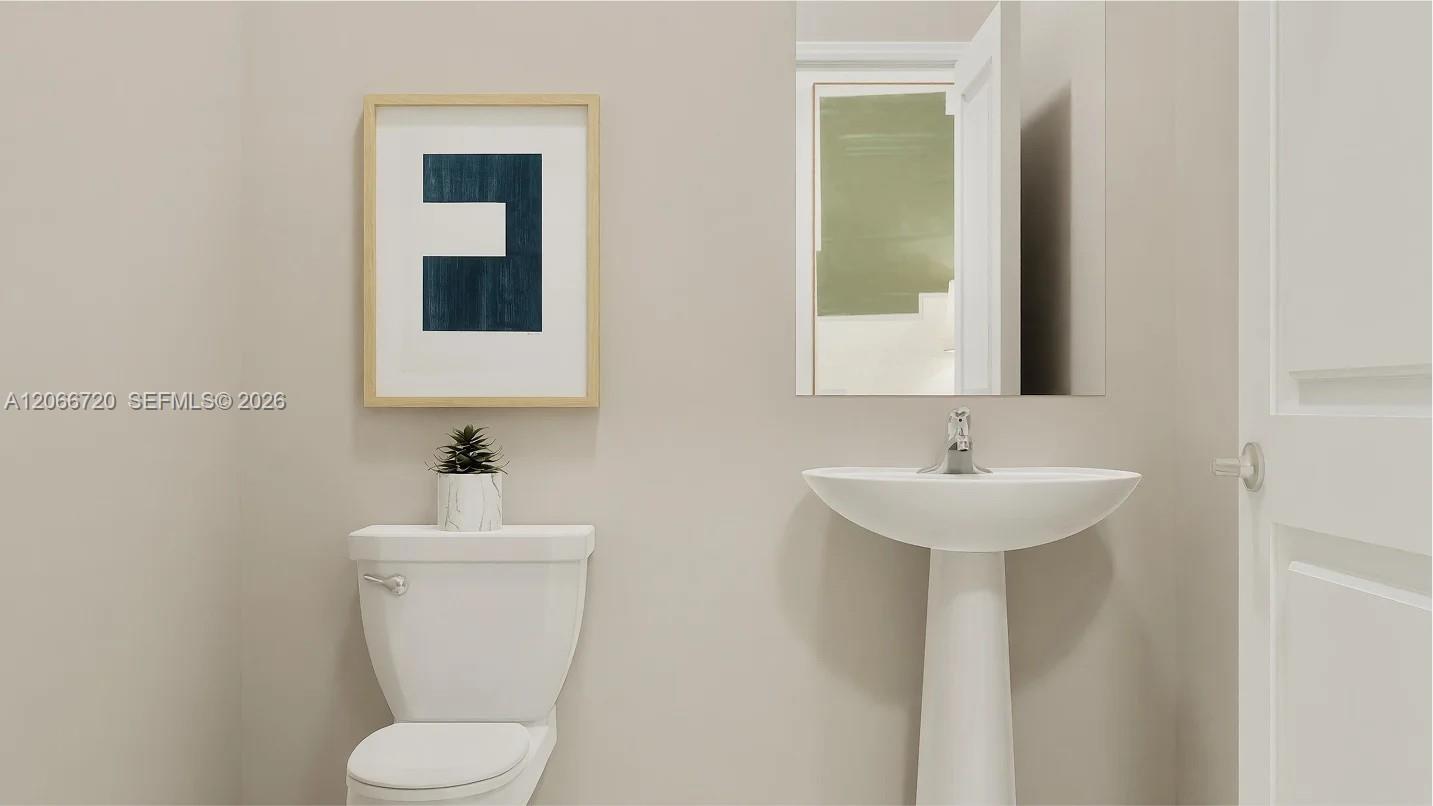 18876 Southwest 314th Street Homestead, FL 33030 - Photo 10 of 10 A powder room tucked off the foyer meets the needs of the whole household and visiting guests.