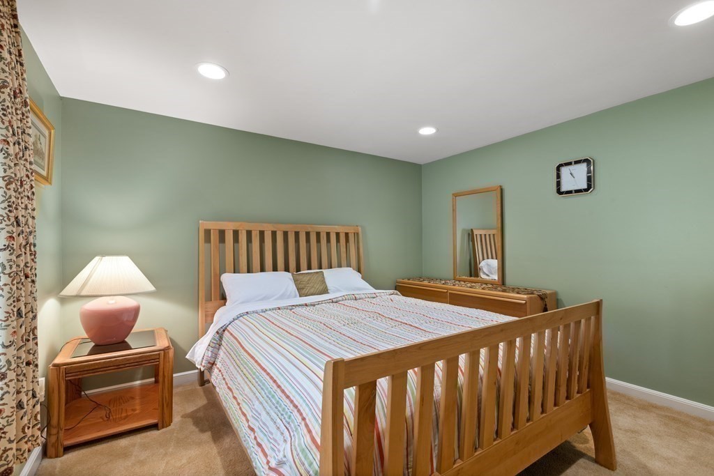 120 Country Club Road Newton, MA 02459 - Photo 12 of 25 a bedroom with a bed and a lamp