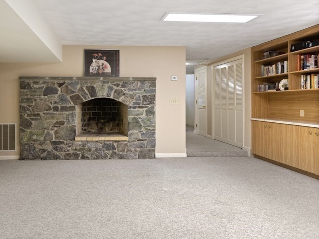 120 Country Club Road Newton, MA 02459 - Photo 17 of 25 a view of a livingroom with a fireplace