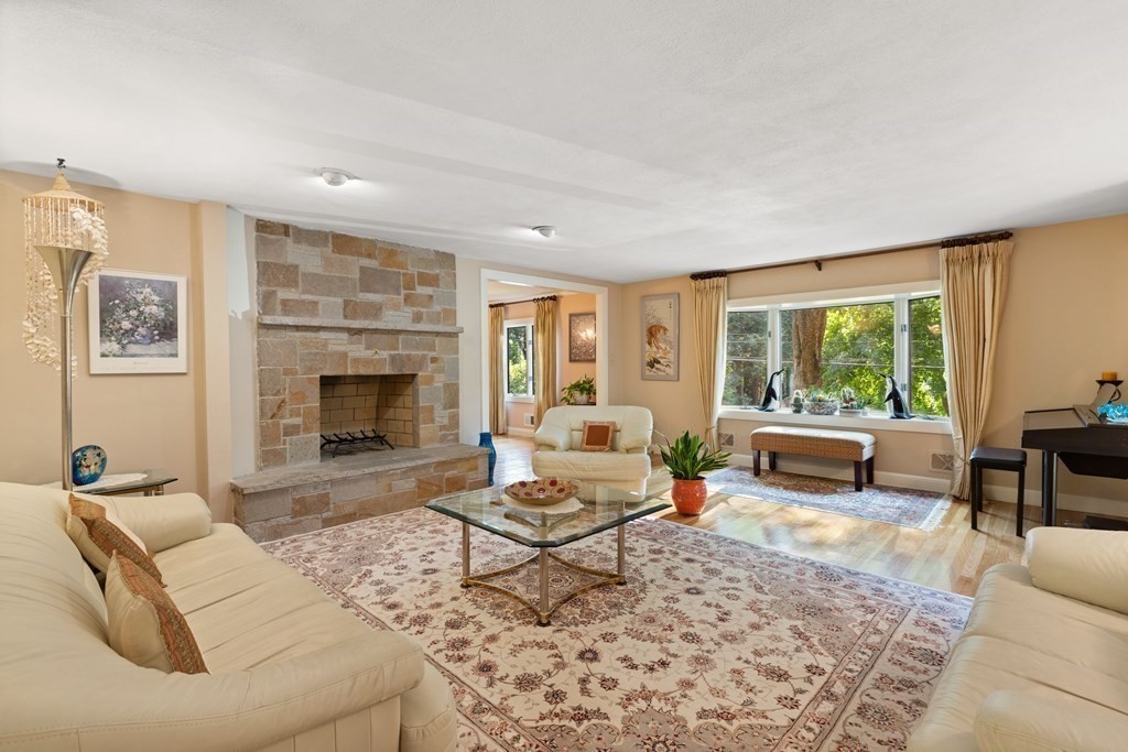 120 Country Club Road Newton, MA 02459 - Photo 2 of 25 a living room with furniture and a fireplace