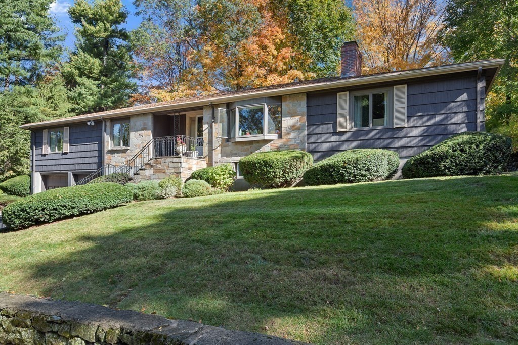 120 Country Club Road Newton, MA 02459 - Photo 22 of 25 a front view of a house with garden and porch