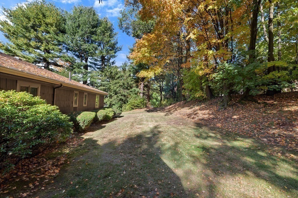 120 Country Club Road Newton, MA 02459 - Photo 24 of 25 a view of a house with a street