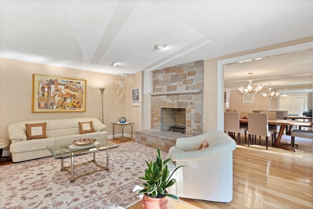 120 Country Club Road Newton, MA 02459 - Photo 3 of 25 a living room with furniture and a fireplace