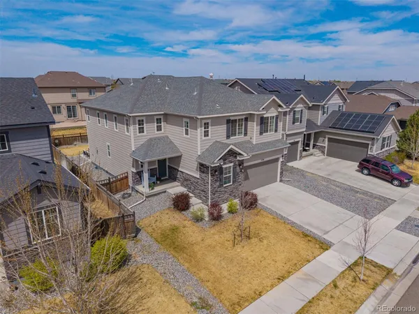 an aerial view of a house with swimming pool