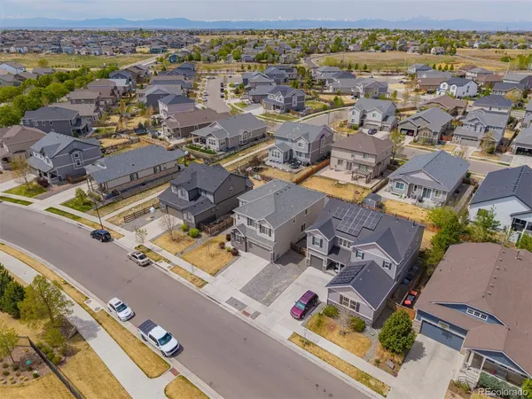 an aerial view of residential building and parking space