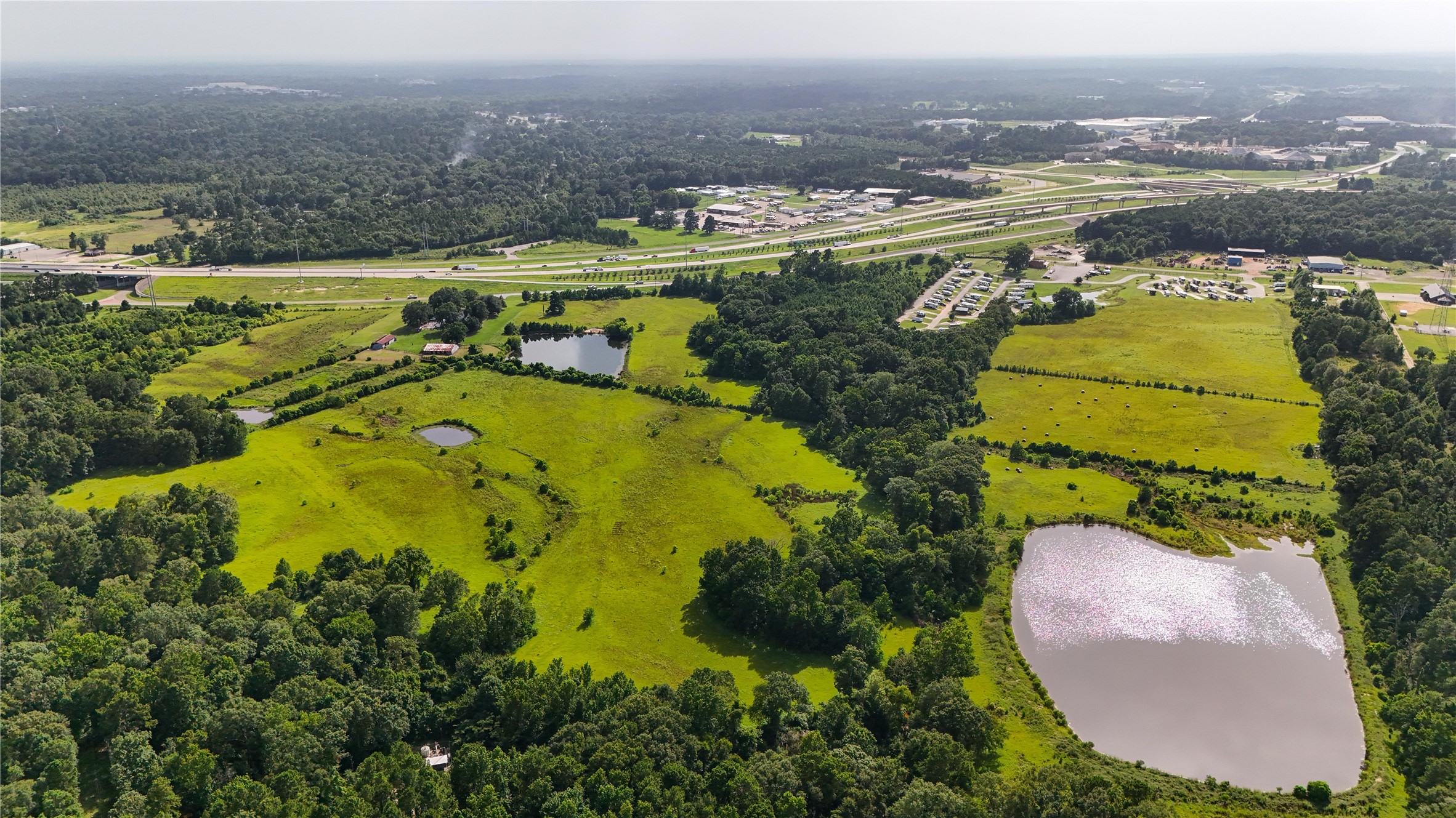 287 Loop 287 Frontage Road Lufkin, TX 75901 - Photo 1 of 22 an aerial view of residential houses with outdoor space