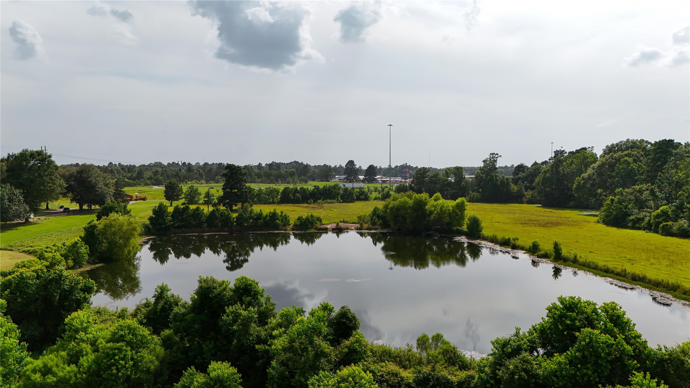 287 Loop 287 Frontage Road Lufkin, TX 75901 - Photo 3 of 22 a view of a lake with a city view