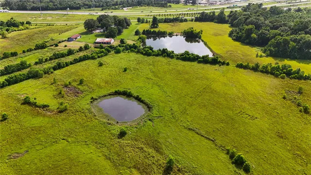 a view of a lake with a swimming pool