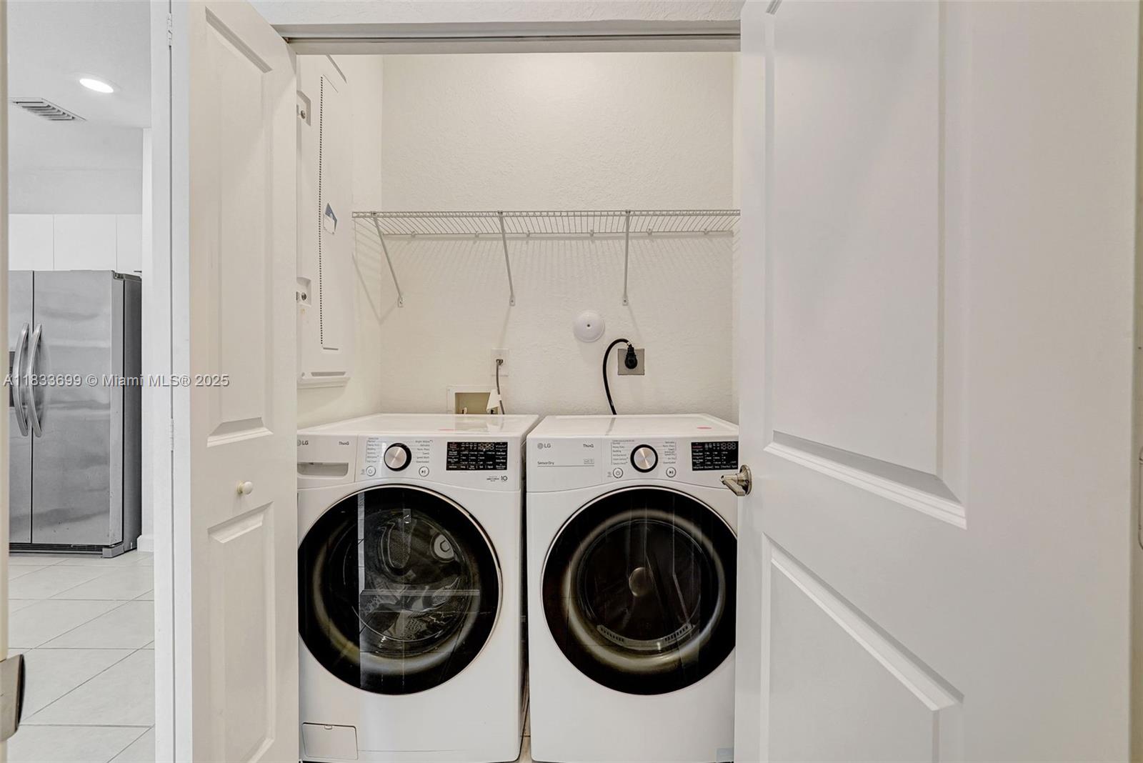 Gladeview Miami, FL 33147 - Photo 13 of 42 a view of a hallway with washer and dryer