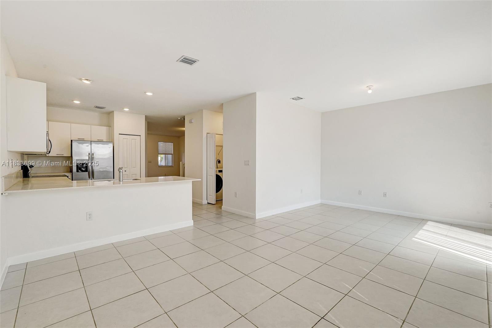 Gladeview Miami, FL 33147 - Photo 16 of 42 a view of kitchen with white cabinets