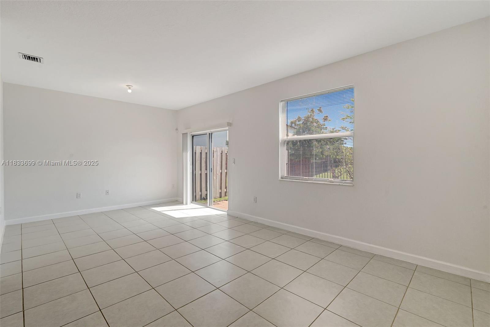 Gladeview Miami, FL 33147 - Photo 20 of 42 a view of an empty room with a window