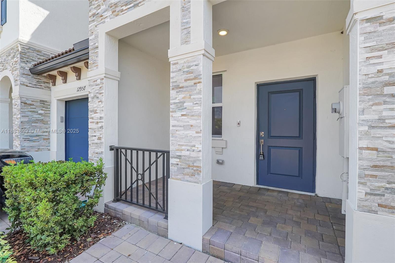 Gladeview Miami, FL 33147 - Photo 2 of 42 front view of a house with a door and wooden door