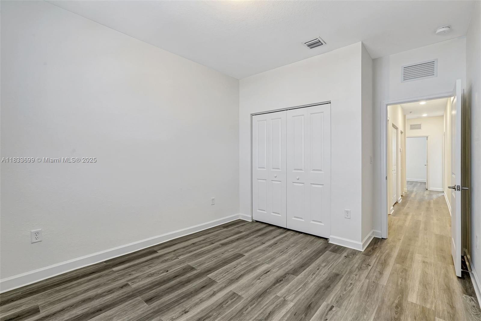 Gladeview Miami, FL 33147 - Photo 23 of 42 a view of a room with wooden floor