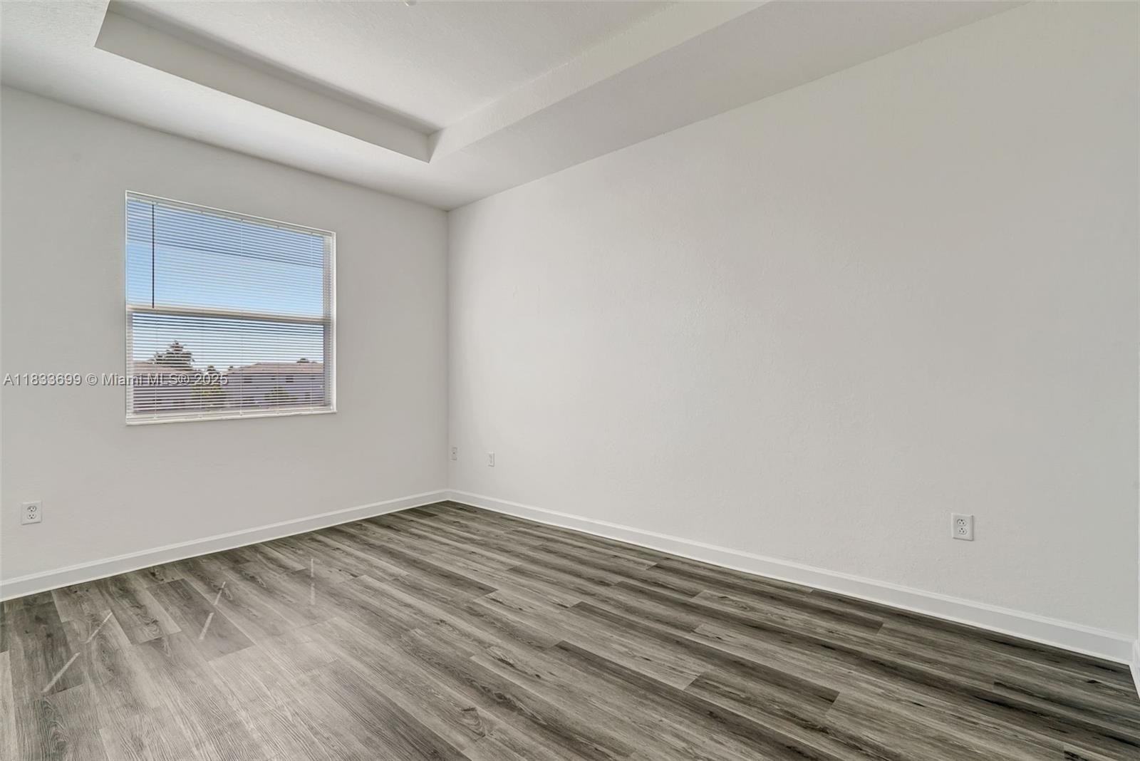 Gladeview Miami, FL 33147 - Photo 30 of 42 a view of room with wooden floor and fan