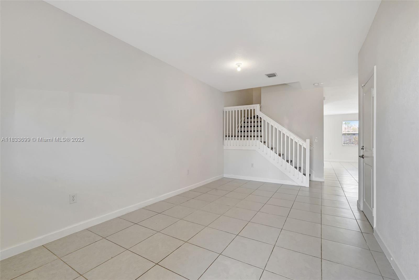 Gladeview Miami, FL 33147 - Photo 3 of 42 a view of an entryway with stairs