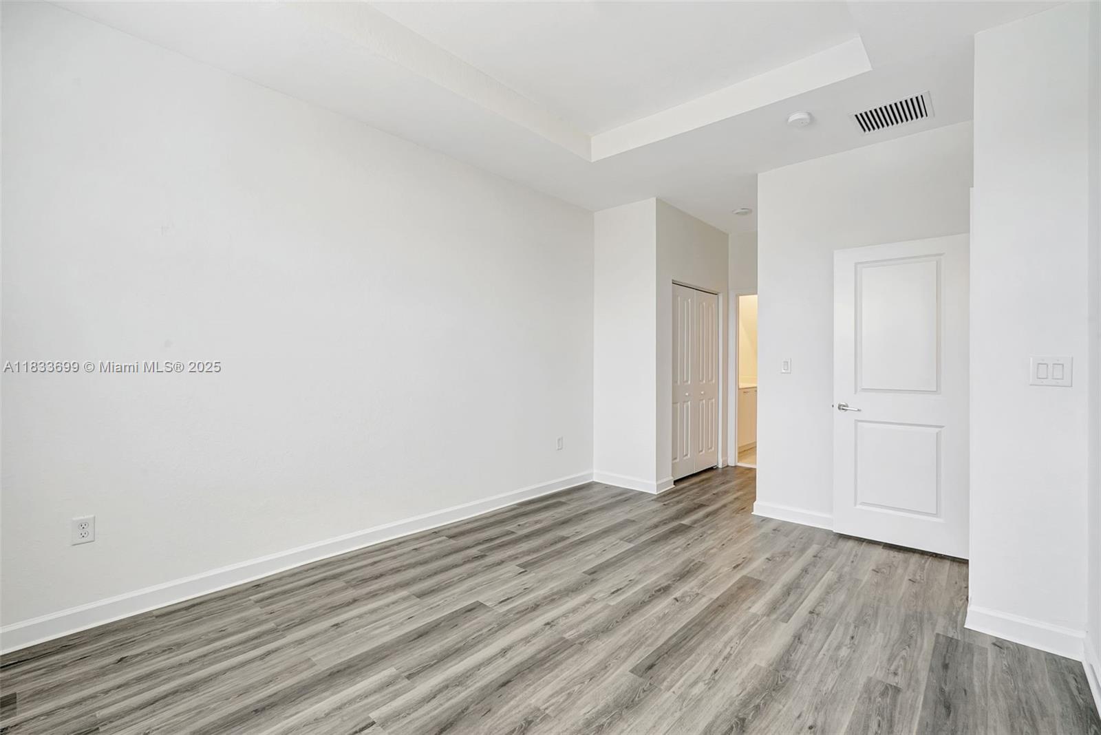 Gladeview Miami, FL 33147 - Photo 31 of 42 a view of an empty room with wooden floor