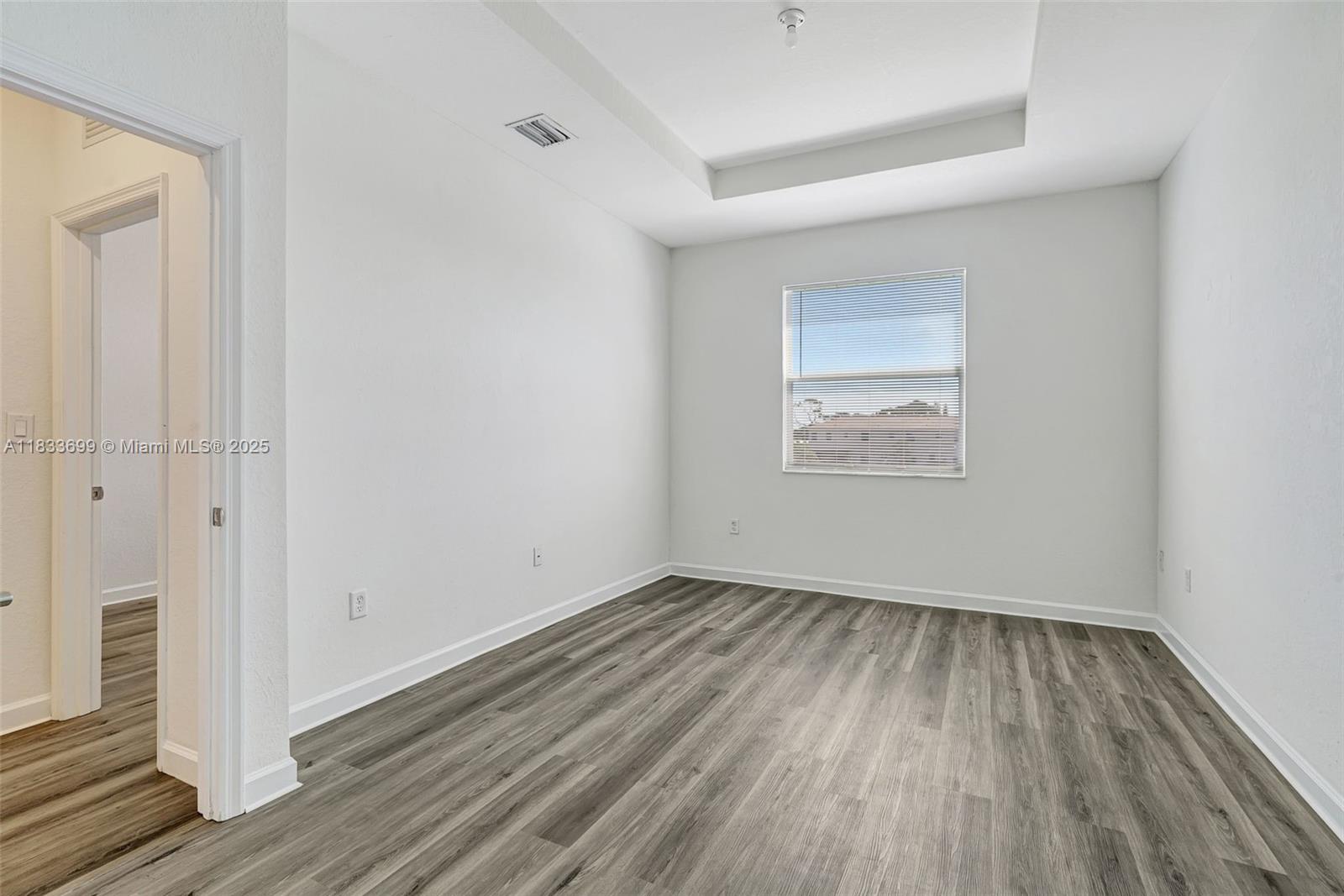 Gladeview Miami, FL 33147 - Photo 33 of 42 a view of an empty room and wooden floor