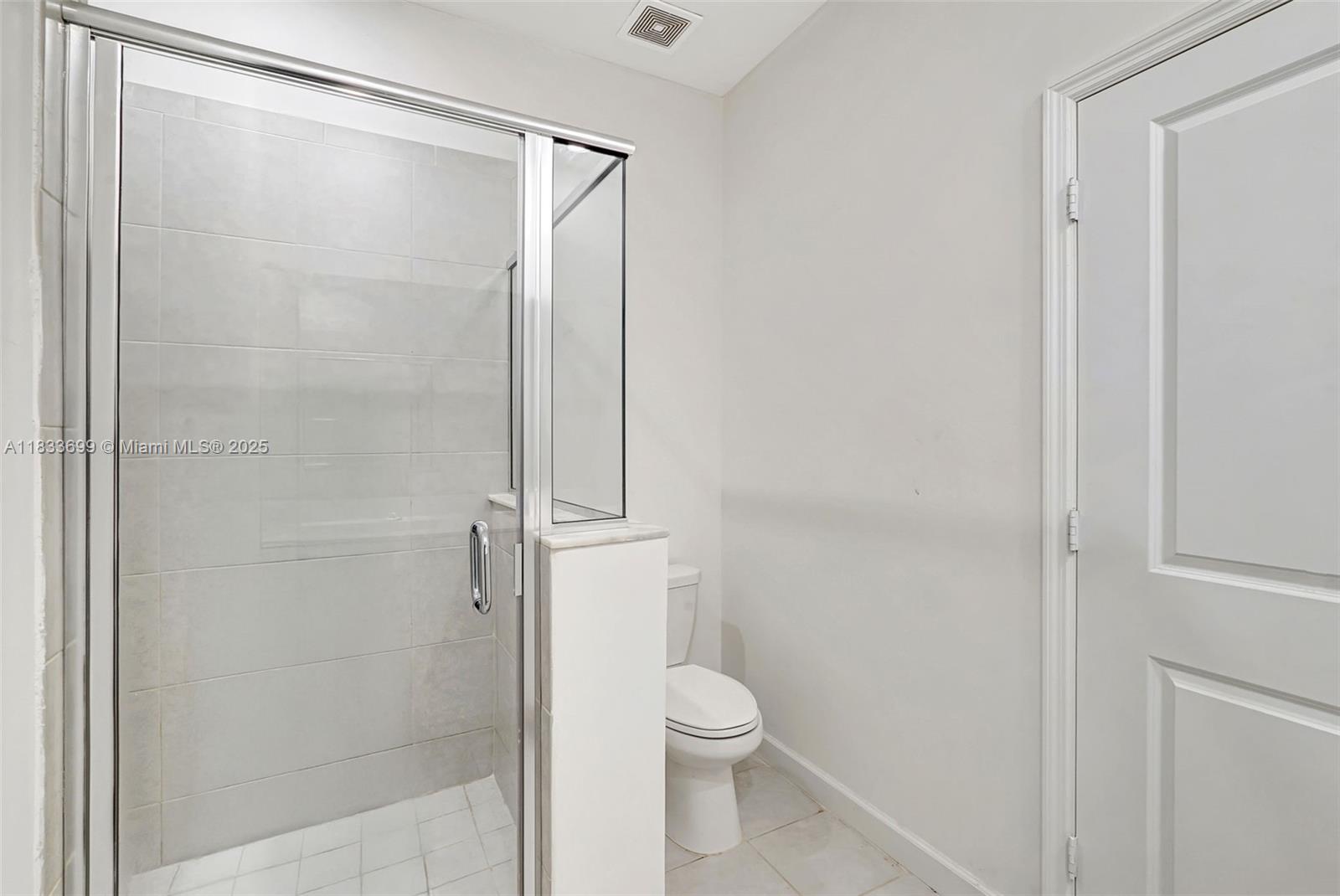 Gladeview Miami, FL 33147 - Photo 40 of 42 a bathroom with a shower and a toilet