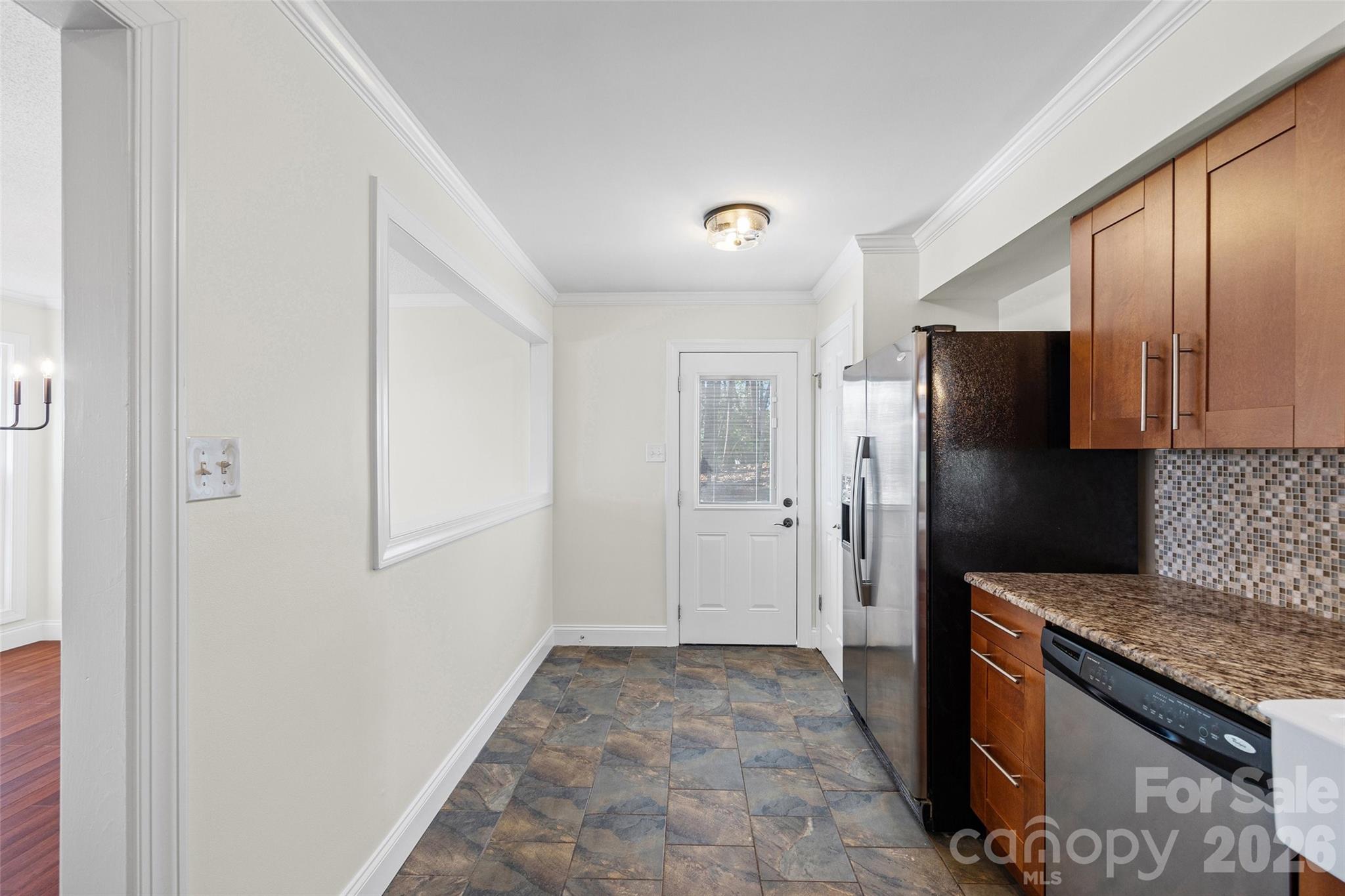 16149 Haroa Court Fort Mill, SC 29708 - Photo 12 of 43 a kitchen with a refrigerator and a sink