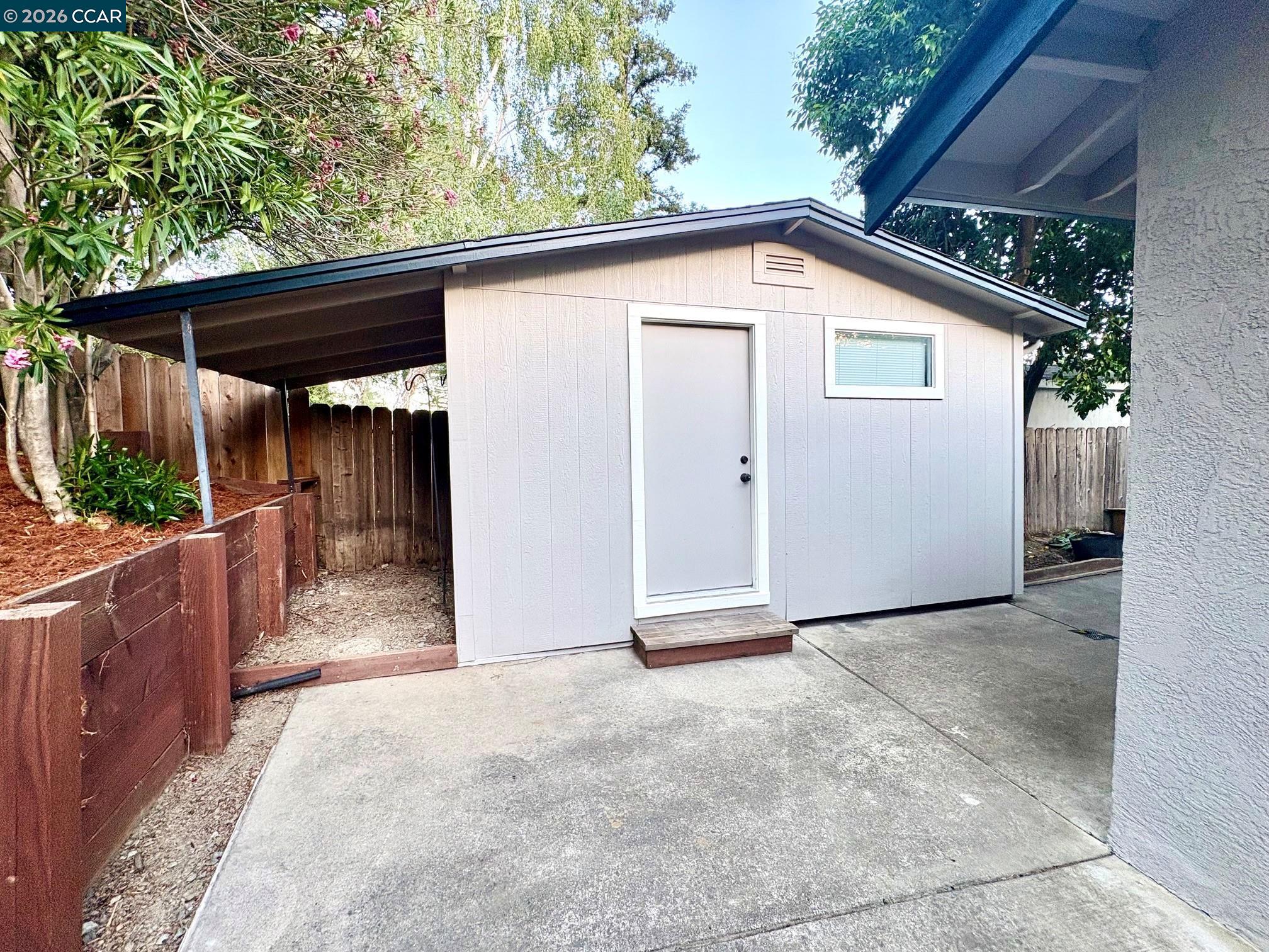 2589 Pebble Beach Loop Lafayette, CA 94549 - Photo 29 of 32 a view of backyard with tree