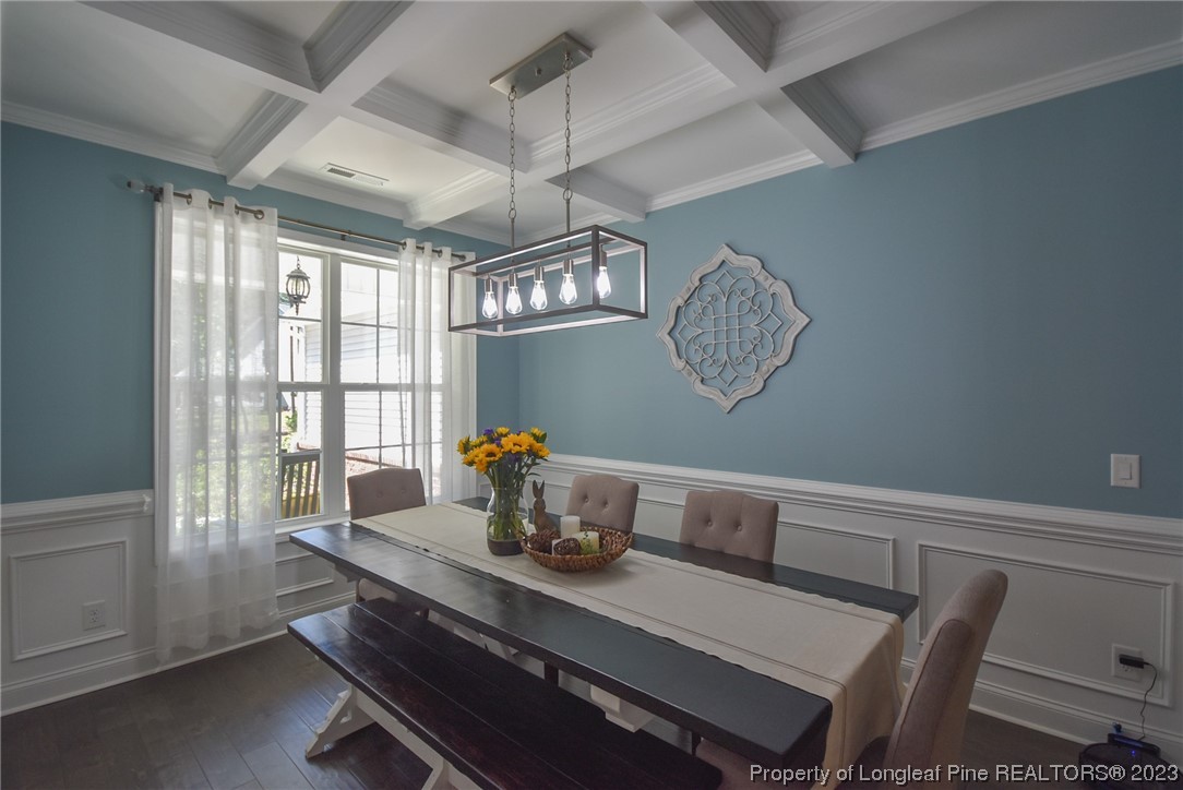 515 Bristling Pine Road Carthage, NC 28327 - Photo 12 of 40 a view of a dining room with furniture window and chandelier