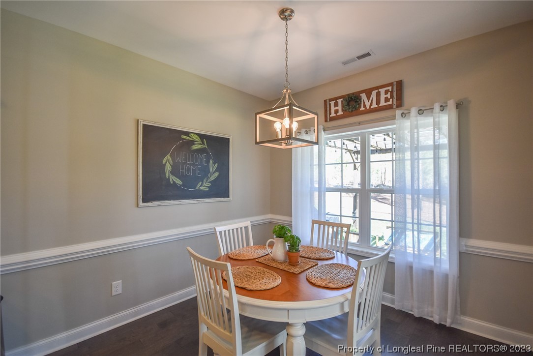 515 Bristling Pine Road Carthage, NC 28327 - Photo 22 of 40 a dining room with furniture and window