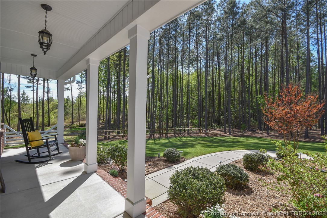 515 Bristling Pine Road Carthage, NC 28327 - Photo 5 of 40 a view of a room with furniture and garden