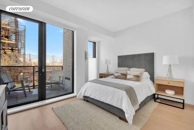 a kitchen a sink and cabinets