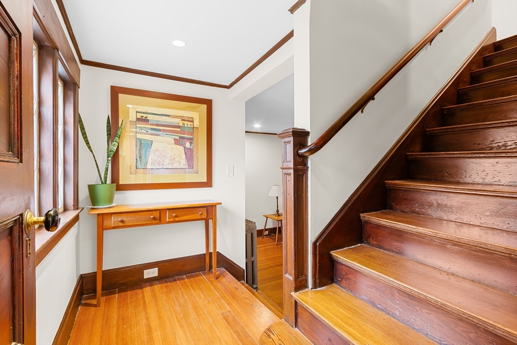 25 Bradford Street Needham, MA 02492 - Photo 20 of 38 a view of an entryway with wooden floor and stairs