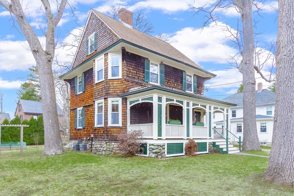 25 Bradford Street Needham, MA 02492 - Photo 2 of 38 a front view of a house with a yard