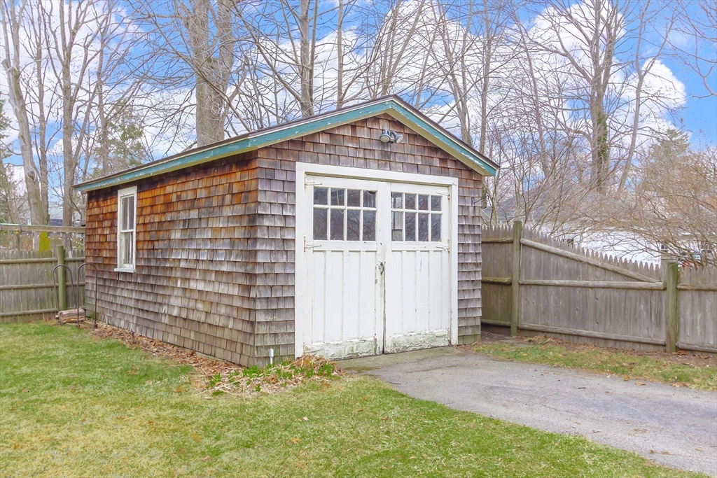 25 Bradford Street Needham, MA 02492 - Photo 37 of 38 a backyard of a house