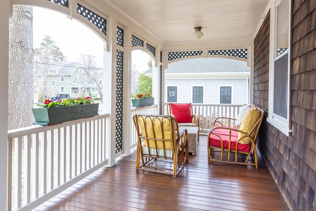 25 Bradford Street Needham, MA 02492 - Photo 4 of 38 a view of a room with furniture wooden floor and windows