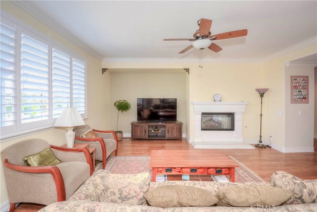 45316 St Tisbury Street Temecula, CA 92592 - Photo 20 of 62 a living room with furniture and a flat screen tv