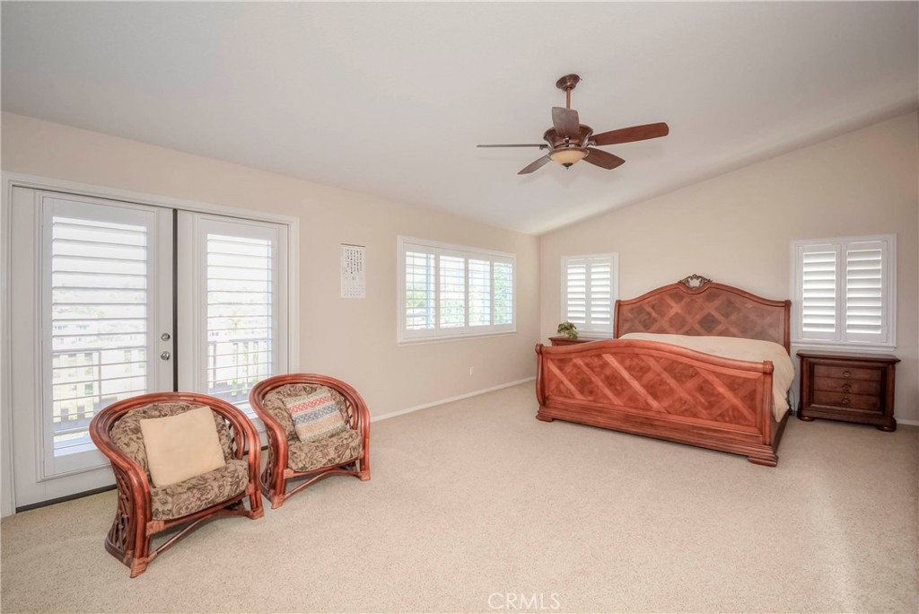 45316 St Tisbury Street Temecula, CA 92592 - Photo 22 of 62 a bedroom with a bed and window