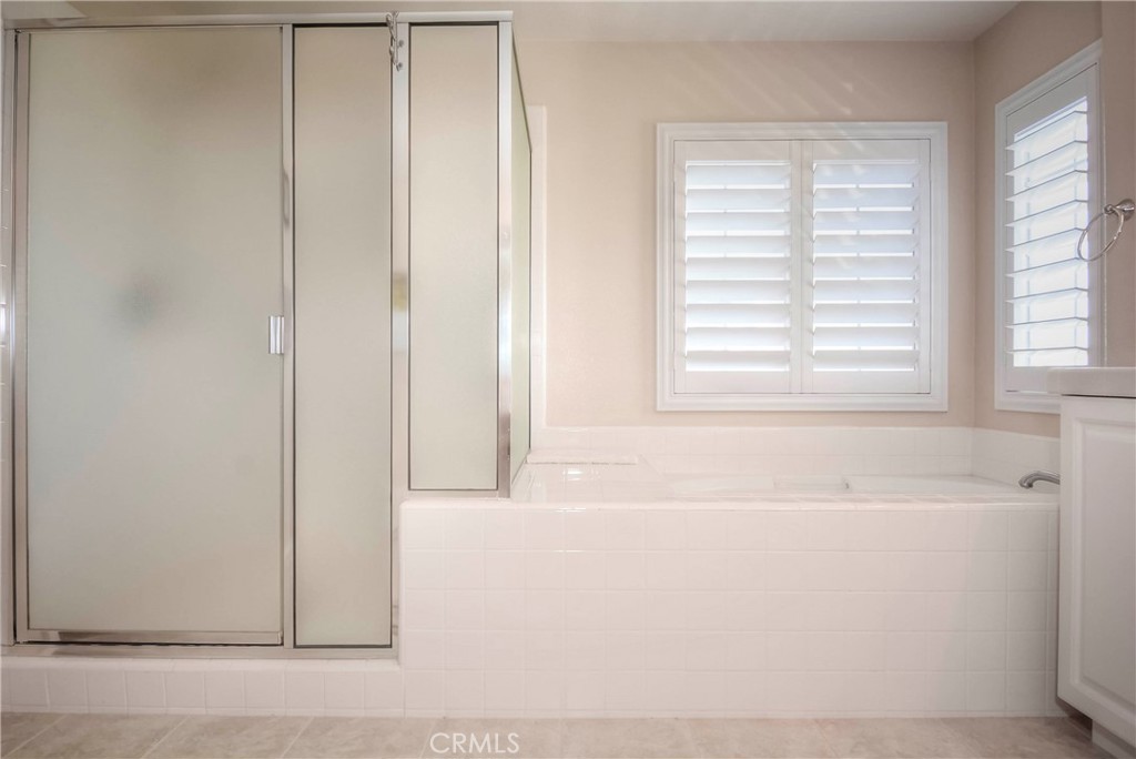 45316 St Tisbury Street Temecula, CA 92592 - Photo 25 of 62 a white bath tub sitting next to a window