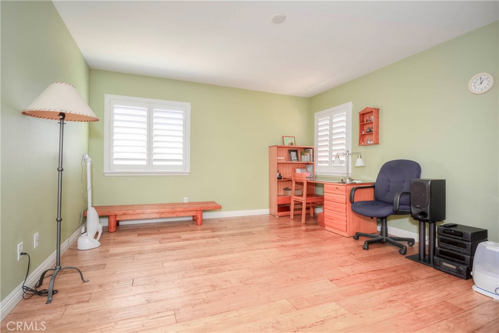 45316 St Tisbury Street Temecula, CA 92592 - Photo 34 of 62 a reading room with furniture and a window