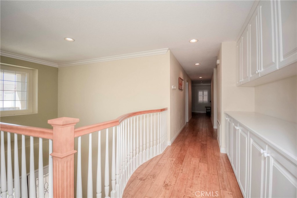 45316 St Tisbury Street Temecula, CA 92592 - Photo 46 of 62 a view of a hallway with wooden floor and entryway