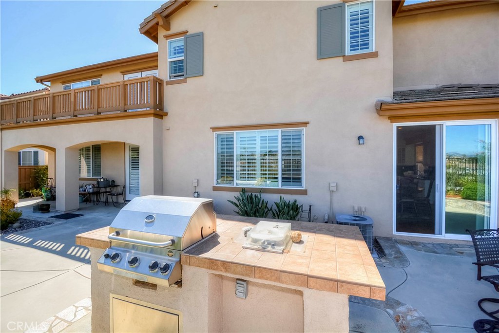 45316 St Tisbury Street Temecula, CA 92592 - Photo 51 of 62 a front view of a house with swimming pool