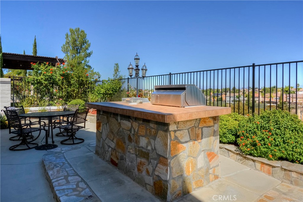 45316 St Tisbury Street Temecula, CA 92592 - Photo 52 of 62 a view of a chairs and table in the patio