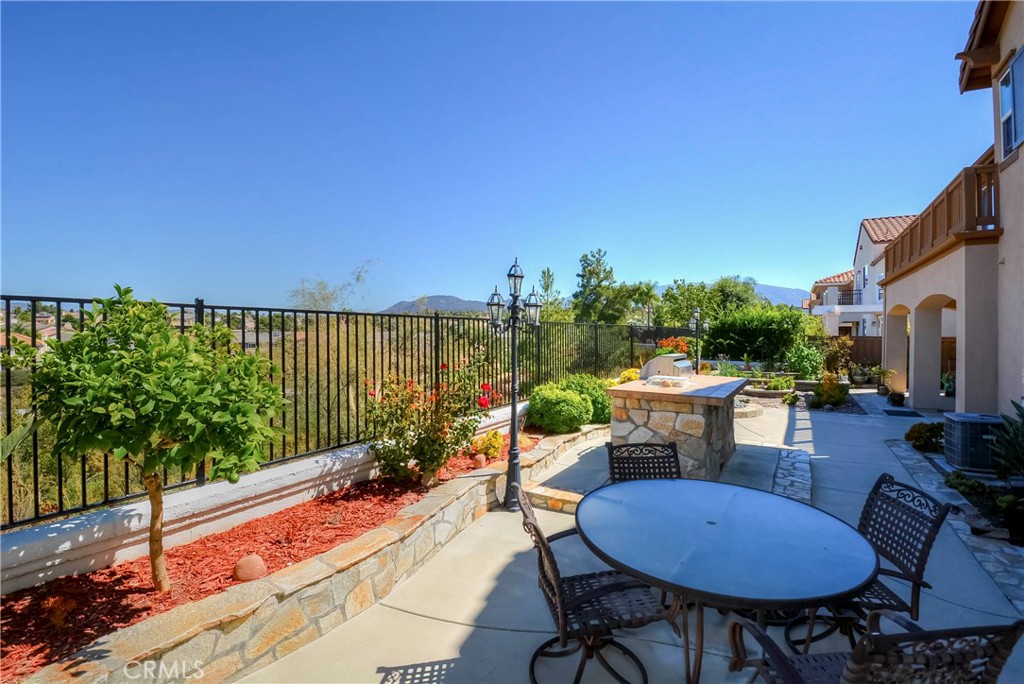 45316 St Tisbury Street Temecula, CA 92592 - Photo 55 of 62 a view of a chairs and table in patio