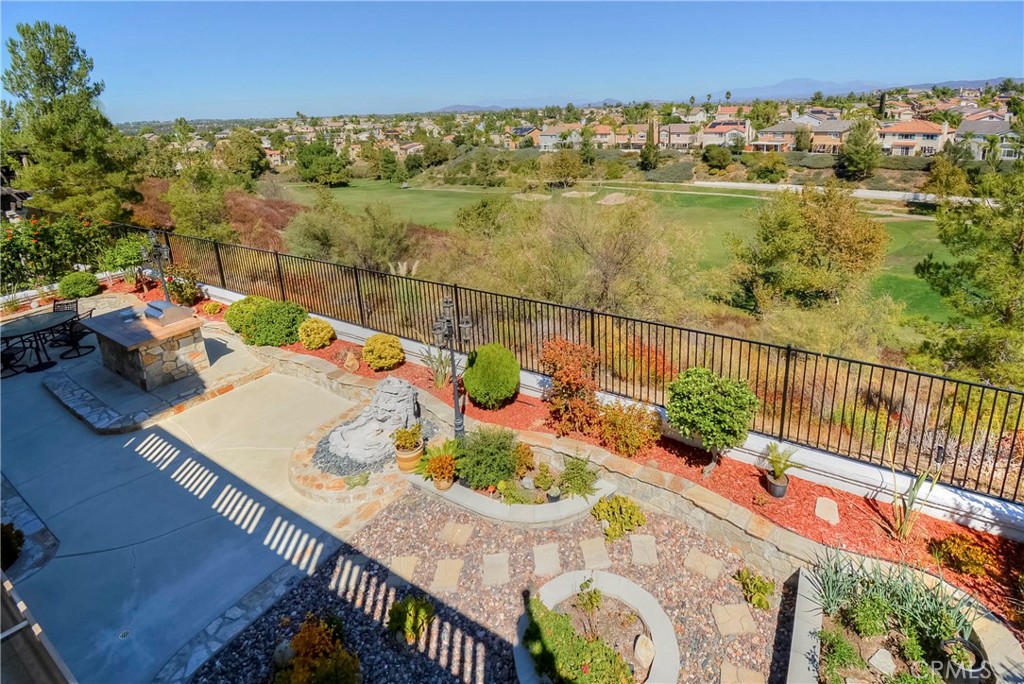 45316 St Tisbury Street Temecula, CA 92592 - Photo 56 of 62 swimming view from deck with patio