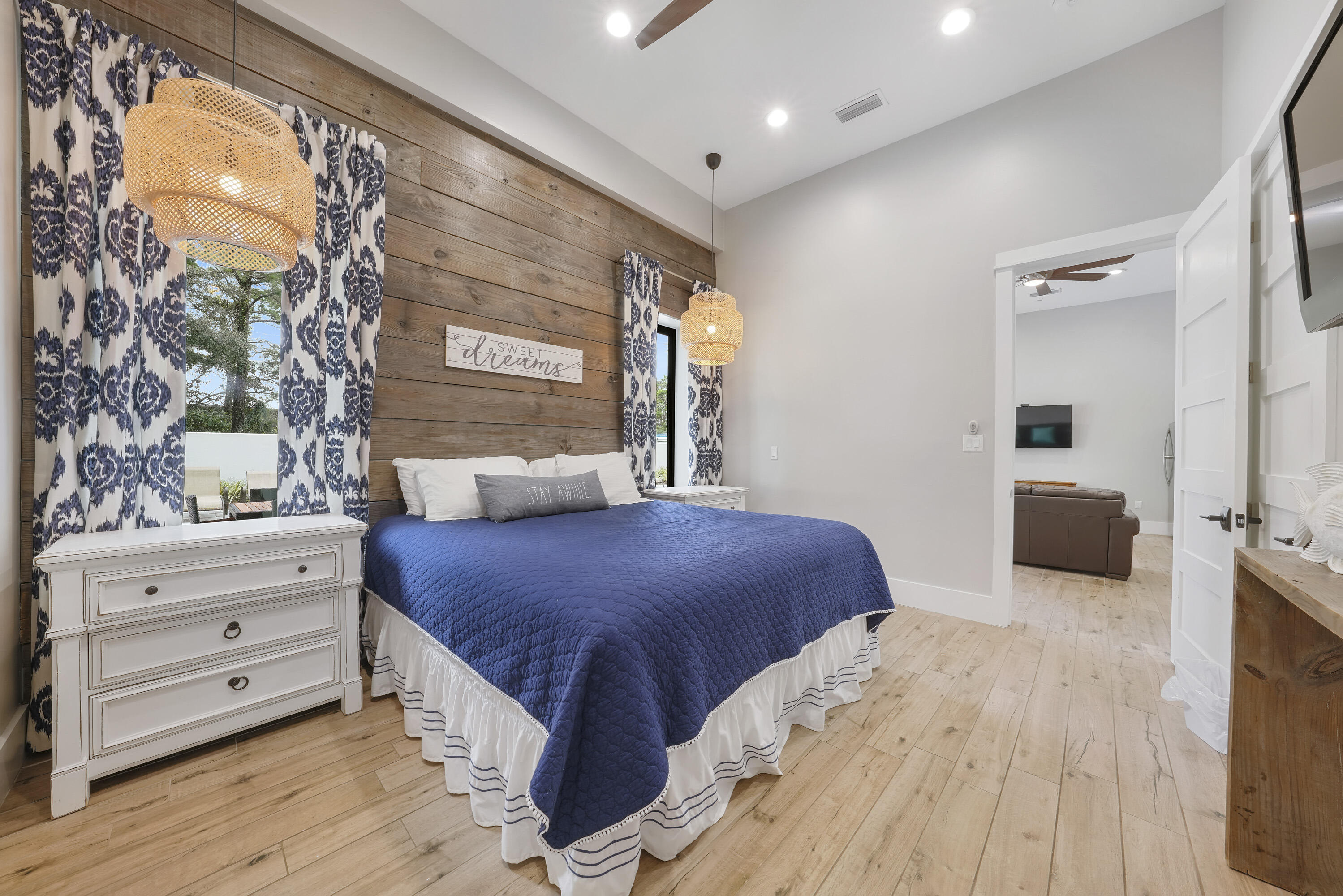 10 Walton Drive Miramar Beach, FL 32550 - Photo 13 of 80 a bedroom with a bed and a flat tv screen on dresser