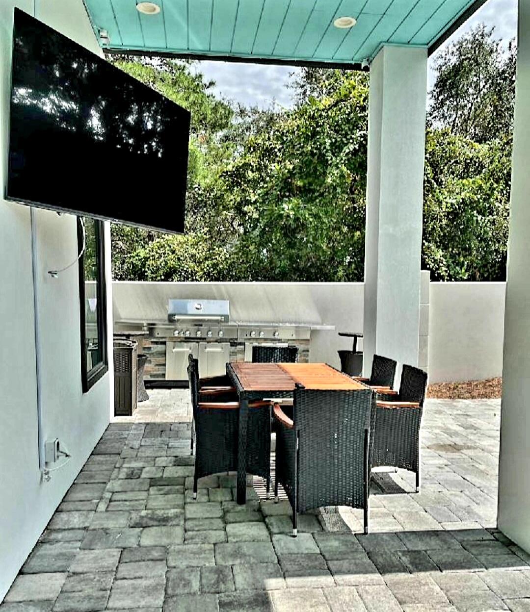 10 Walton Drive Miramar Beach, FL 32550 - Photo 22 of 80 a outdoor dining space with furniture and outdoor view