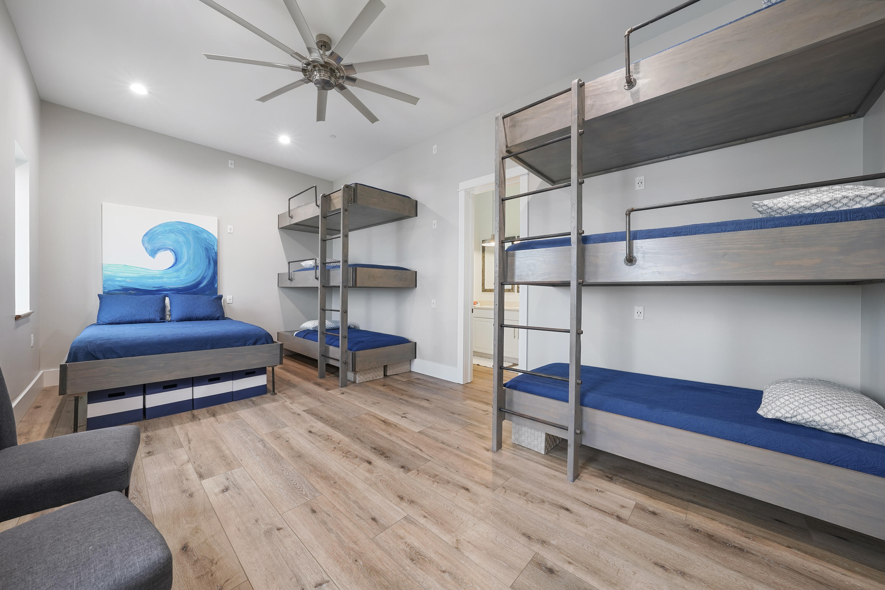 10 Walton Drive Miramar Beach, FL 32550 - Photo 42 of 80 a bedroom with furniture and a wooden floor