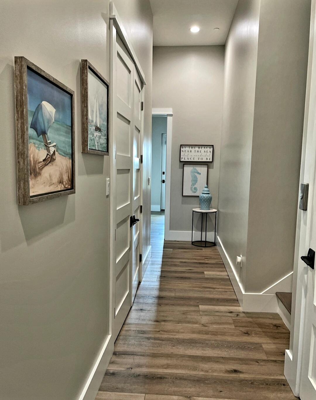 10 Walton Drive Miramar Beach, FL 32550 - Photo 47 of 80 a view of a hallway with wooden floor and staircase